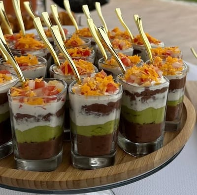 a tray of desserts with a variety of desserts