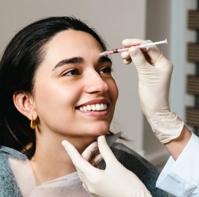 Happy lady getting botox in Nanaimo