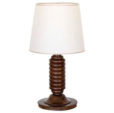 a lamp with a lamp shade on a table
