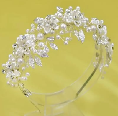 a tiaper headband with pearls and crystals