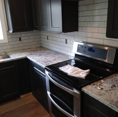 Cabinets and tile backsplash