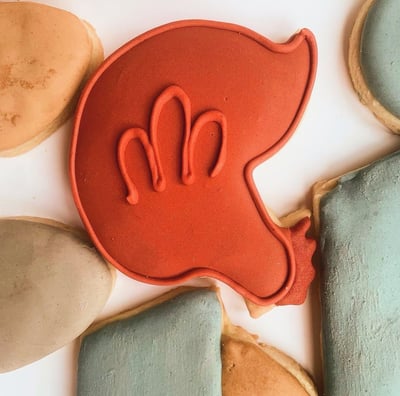 a chicken cookie. A set of custom sugar cookies farm and chicken themed freshly baked and quickly de