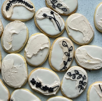Chic wedding sugar cookies for guests to eat individually. Large quantities made for the event