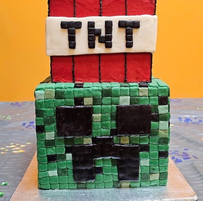 a minecraft creeper and TNT Cakes