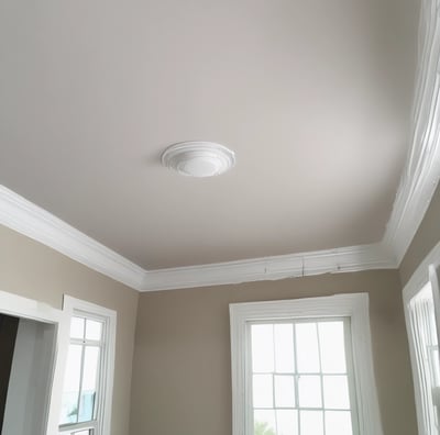 Two people are working on the exterior of a building, seemingly painting or repairing it. The building is surrounded by a framework of bamboo scaffolding. The sky is a soft gradient of pale yellow to orange, suggesting either early morning or late evening. The building itself is painted in light blue and has some decorative elements in darker shades.