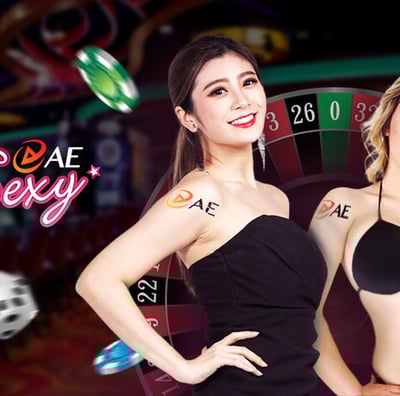 two women in bikinis playing roulet at a casino