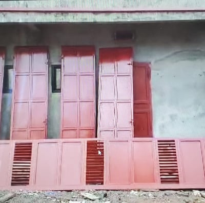 a red door with red shutter shutters and shutter shutters