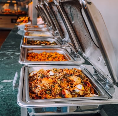 a buffet with many different types of food