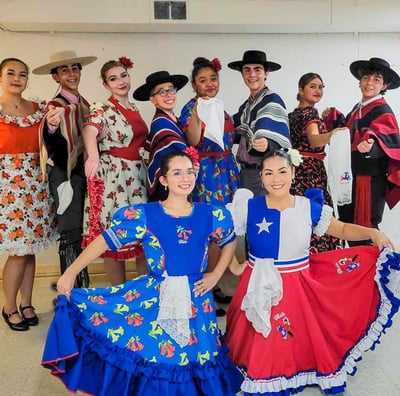a group of people in chilean style costumes