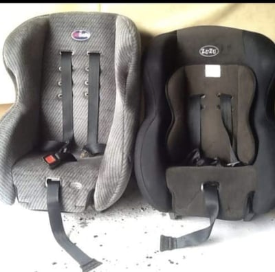bali baby holiday two baby's car seats with a seatbelt