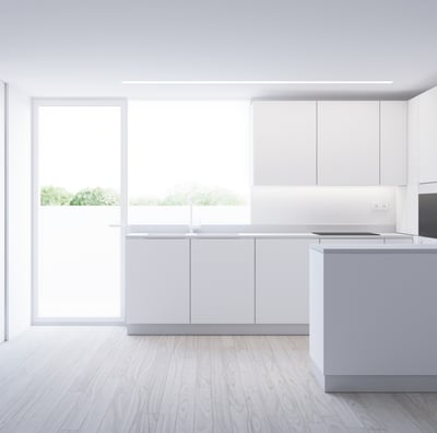 a kitchen with a white counter top and a white counter top