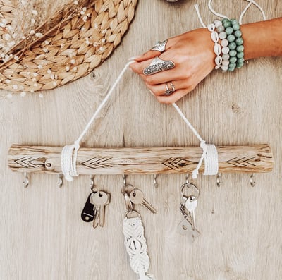 boho girl hand holding key organizer
