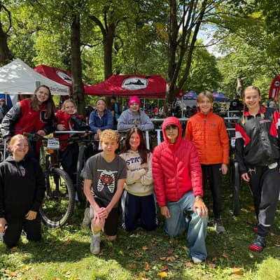 Youth mountain biker navigating singletrack at Battle Creek