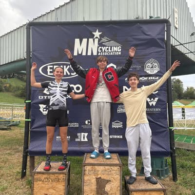 Central MTB riders celebrating after a race finish