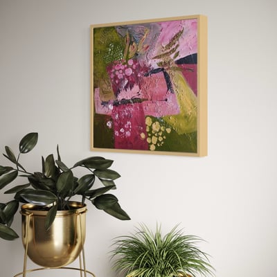 Adele’s abstract painting framed on the wall in living room