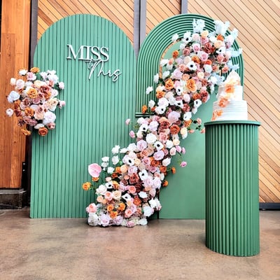Miss To Mrs bridal shower backdrop in green at a restaurant in Oakvile
