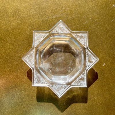 a glass bowl with a glass bowl of water