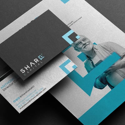 a business card with a business card holder realtor brand