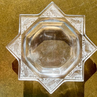 a glass bowl with a glass bowl of water