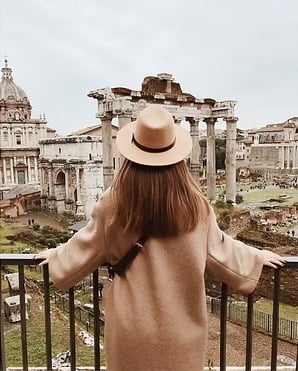 Traveller viewing an ancient ruin. Travel With Character Link.