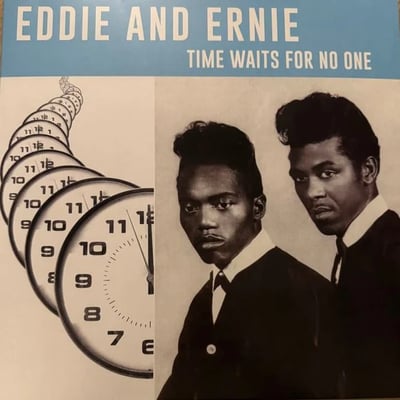 a picture of a picture of a couple of colored men, singers Eddie and Ernie