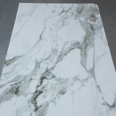 Classic Calacatta with striking vein details and a smooth, polished finish