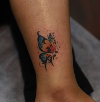 Unique Butterfly tattoo watercolor fill on leg by Dudo’s Hyderabad