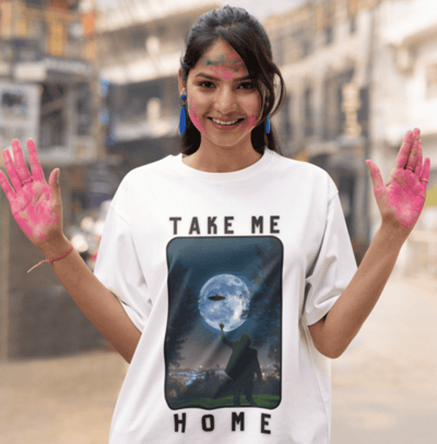 a woman with painted hands wearing a printed tshirt