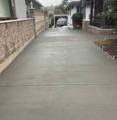 freshly laid concrete for a new driveway