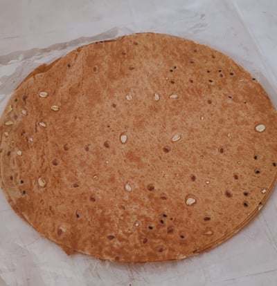 A bag of Whole wheat Saj Bread with Seeds