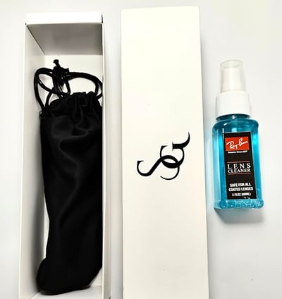 a box with a black bag and a black bag