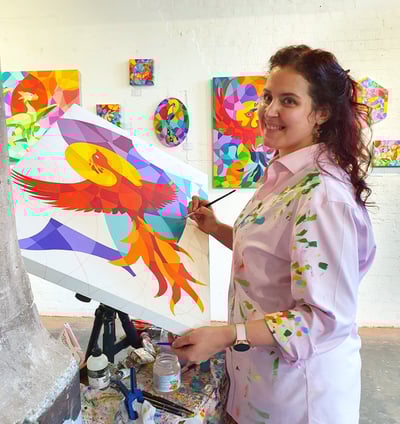 UK Artist Tanja Hassel painting live at exhibition