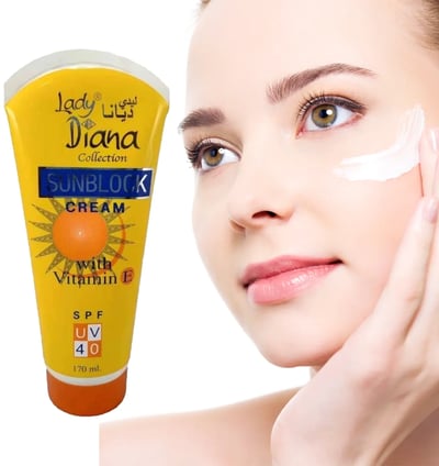 a woman with a sunflower cream on her face