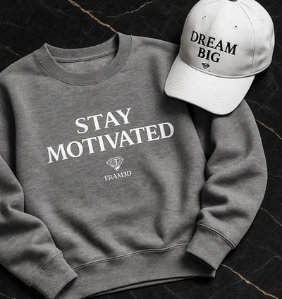 a crewneck with a baseball cap on it with motivational sentence