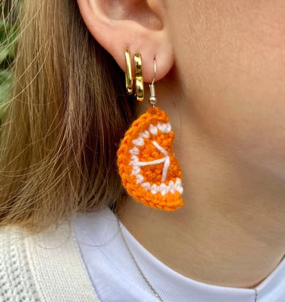 Handmade crochet orange slice earrings