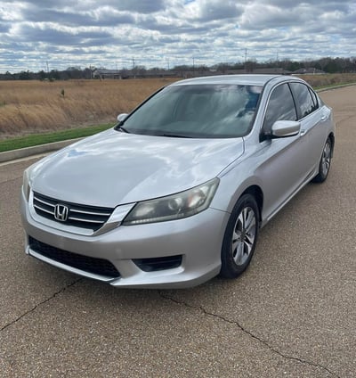a silver honda accord