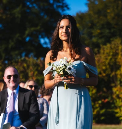 Bride's Maid Holding bouquet