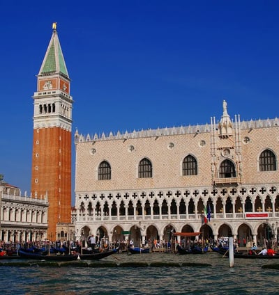 Doge`s Palace with a clock tower in the middle of it