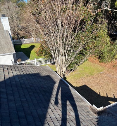 picture of gutter system after studs gutters cleaned it