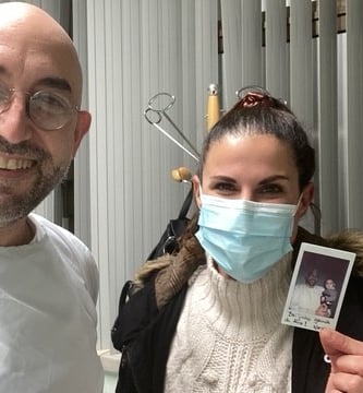 a man and woman in masks and masks on their faces