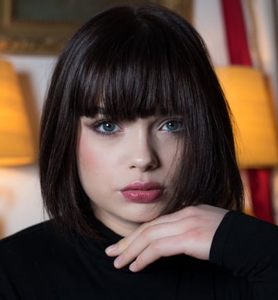a woman with a black shirt and a black shirt