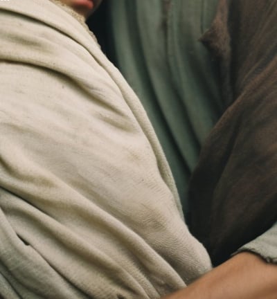 Jesús cargando a niño