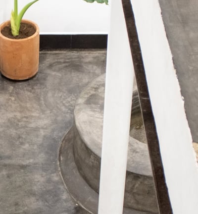 a potted planter with a potted plant in it