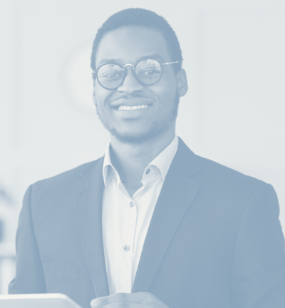 a man in a suit and glasses holding a tablet