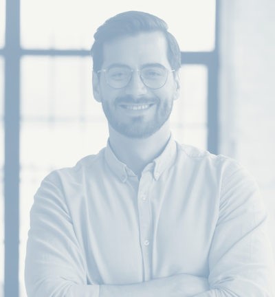 a man with glasses and a white shirt