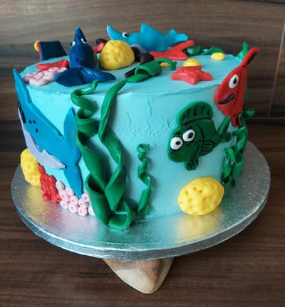 a cake with a fish and fish on it