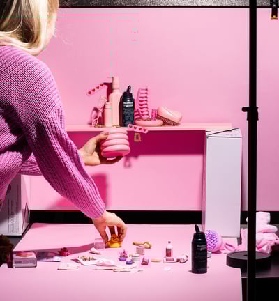 blonde girl styling pink beauty related photography scene