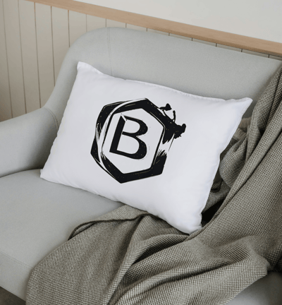 a pillow - like pillow with a monogram on it