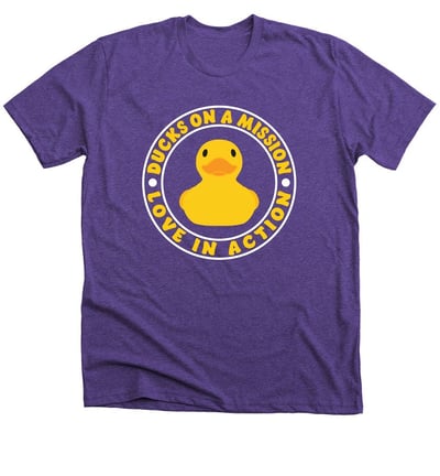 a purple t - shirt with a ducky in the middle of it