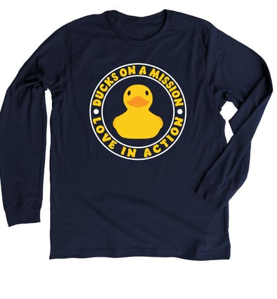 a ducky wearing a t - shirt with a rubber ducky on it